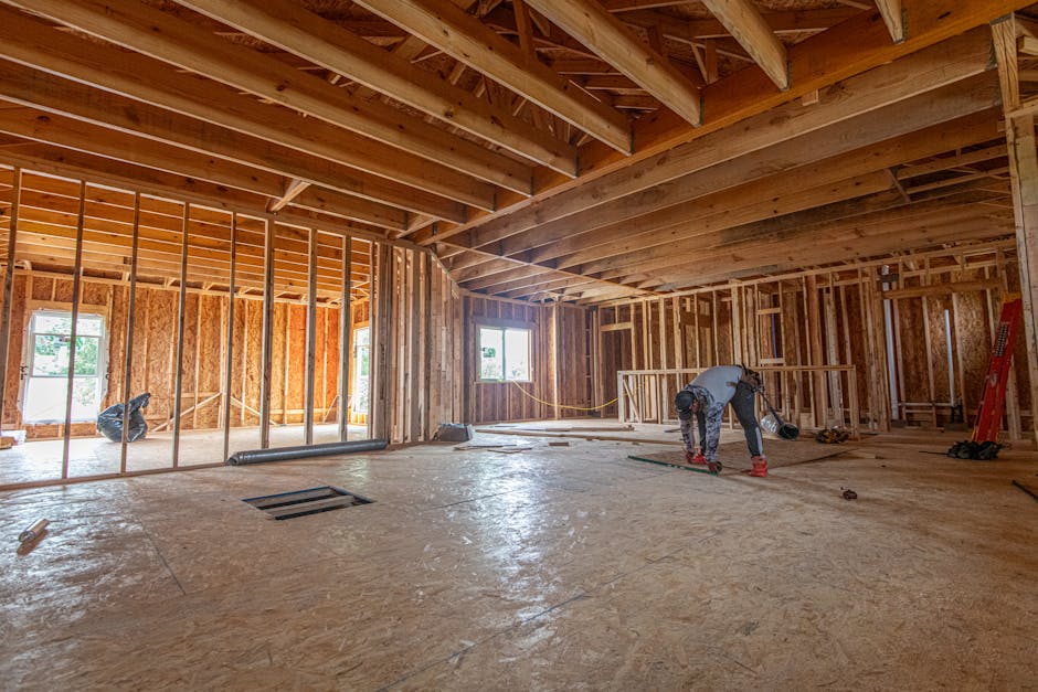 Construction framing showing the structural phase of a turnkey renovation